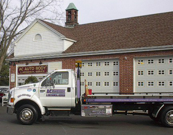 AC Auto Body Flatbed Tow Truck